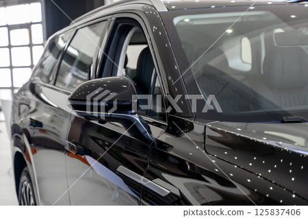 elements of the design of a modern car in a car showroom 125837406