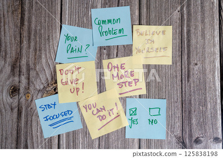 Motivational sticky notes with positive affirmations on wooden background Motivational sticky notes with positive affirmations on wooden background 125838198