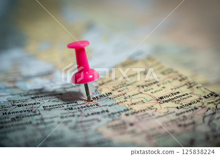 Pink push pin marking berlin germany on map 125838224