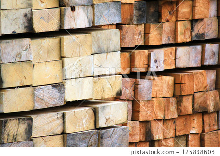 Building material made of wood in the form of boards 125838603