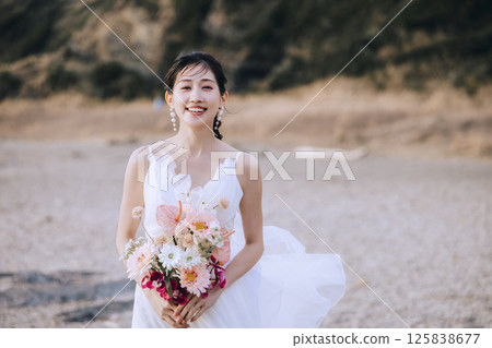 A young couple taking pre-wedding photos at Jogashima A young couple taking pre-wedding photos at Jogashima 125838677