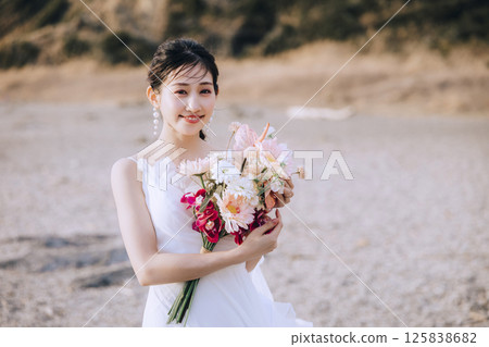 A young couple taking pre-wedding photos at Jogashima A young couple taking pre-wedding photos at Jogashima 125838682
