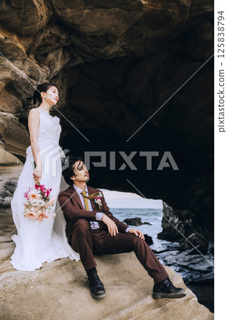 A young couple taking pre-wedding photos at Jogashima A young couple taking pre-wedding photos at Jogashima 125838794