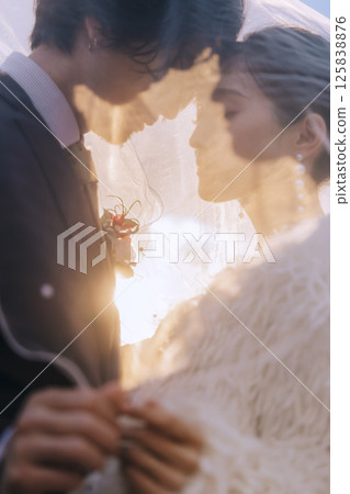 A young couple taking pre-wedding photos at Jogashima A young couple taking pre-wedding photos at Jogashima 125838876