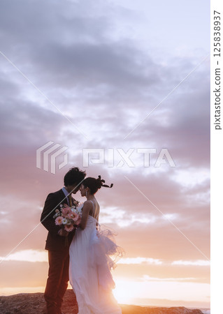 A young couple taking pre-wedding photos at Jogashima A young couple taking pre-wedding photos at Jogashima 125838937