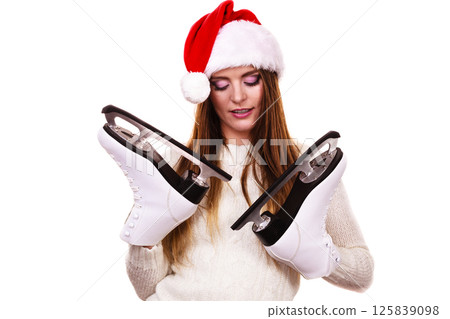 Girl with santa claus cap. 125839098