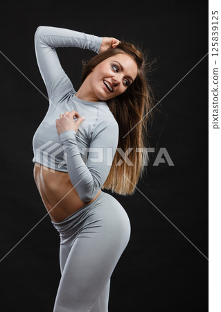 Sport fit woman in thermal clothes. 125839125