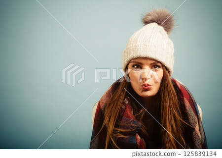 Positive girl in autumn season clothing Positive girl in autumn season clothing 125839134