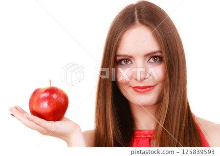 Woman charming girl colorful makeup holds apple fruit Woman charming girl colorful makeup holds apple fruit 125839593