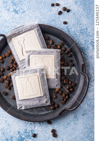 Close-up of drip coffee paper bag 125840137