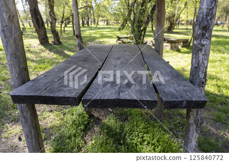 wooden gazebo in the forest 125840772