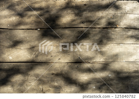 wooden plank table sun and shadows texture wooden plank table sun and shadows texture 125840782