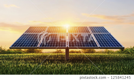 Solar panel in green field at sunset, showcasing renewable energy 125841245