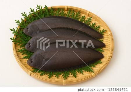 Freshly caught flounder in a basket 125841721