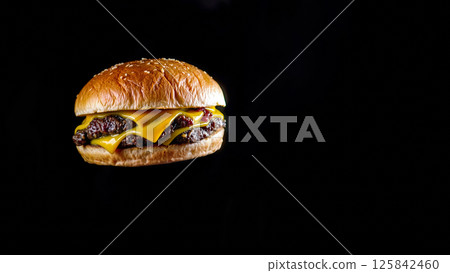 Great burger on a dark isolated phone 125842460