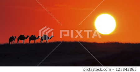 Camel caravan silhouetted against blazing orange sunset in desert landscape, copy space Camel caravan silhouetted against blazing orange sunset in desert landscape, copy space 125842865