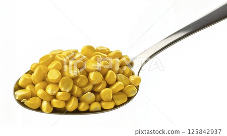 Corn kernels on metal spoon isolated on white background with clipping path 125842937