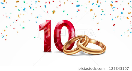 Red number 10 and golden wedding rings. Red number 10 and golden wedding rings. 125843107