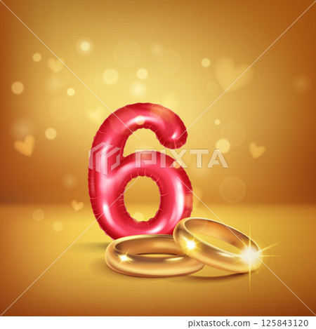Red number 6 and gold wedding rings. Red number 6 and gold wedding rings. 125843120