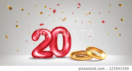 Red number 20, gold wedding rings and confetti. Red number 20, gold wedding rings and confetti. 125843160