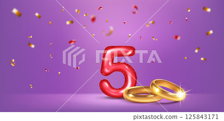 Red number 5, gold wedding rings and confetti. Red number 5, gold wedding rings and confetti. 125843171