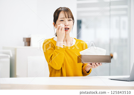 Women suffering from hay fever Women suffering from hay fever 125843510