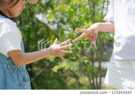 Girl doing rock music Girl doing rock music 125843845