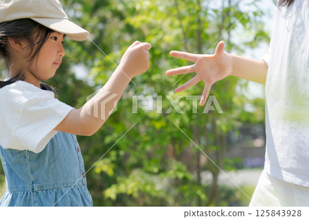 Girl doing rock music 125843928