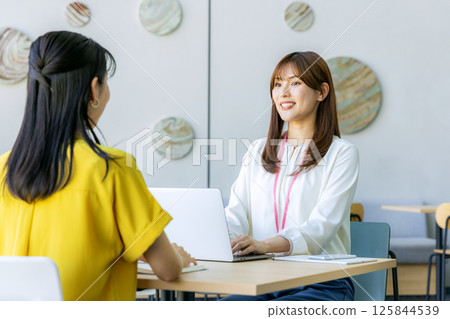 Woman working in coworking space 125844539