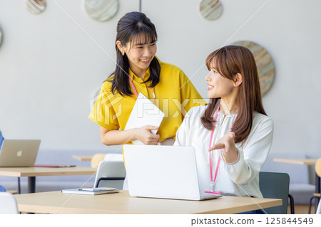 Business person using a laptop 125844549
