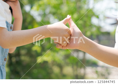 Girl wrestling with fingers 125844745