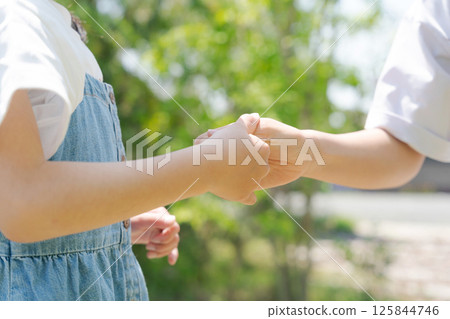Girl wrestling with fingers 125844746