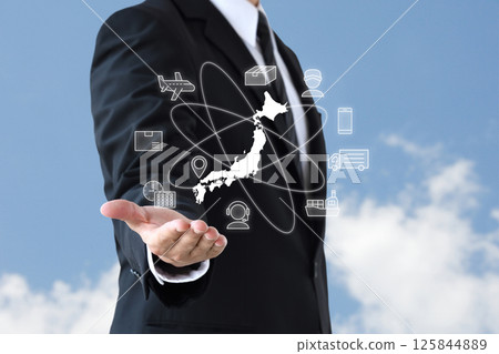 一名身穿西裝的男子控制物流的圖像 一名身穿西裝的男子控制物流的圖像 125844889
