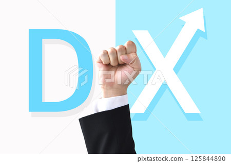 The letters DX and a businessman's raised fist The letters DX and a businessman's raised fist 125844890