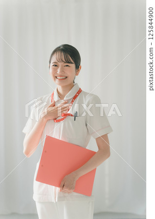 The presence of a smiling nurse gives a sense of security 125844900
