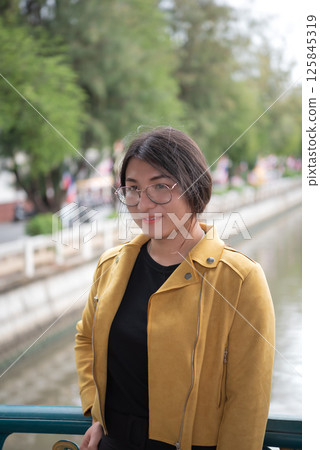 Woman (LGBTQ) posing outdoor fashion style 125845319