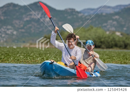 Kayaking on a lake 125845426