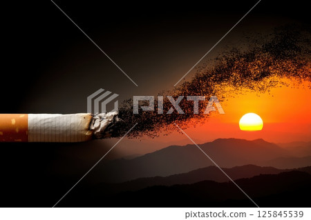 Pixelated Trail of Smoke from a Cigarette against a Sunset Background Over Mountains Pixelated Trail of Smoke from a Cigarette against a Sunset Background Over Mountains 125845539