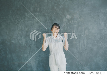 Young nurse's fist pump Young nurse's fist pump 125848410