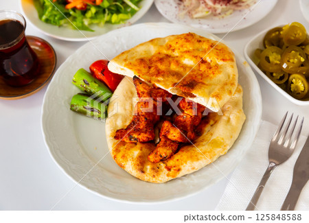 Chicken shish kebab - Turkish tavuk sis closeup Chicken shish kebab - Turkish tavuk sis closeup 125848588