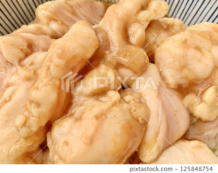 Stock photo: Raw meat (chicken) in a container 125848754