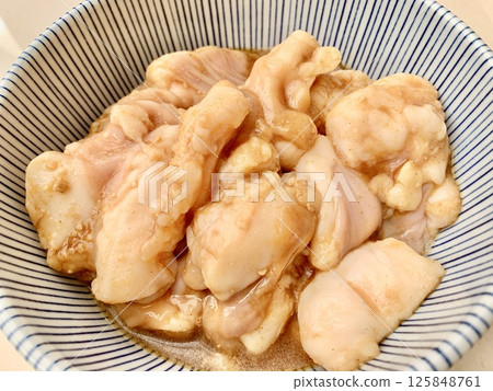 Stock photo: Raw meat (chicken) in a container Stock photo: Raw meat (chicken) in a container 125848761