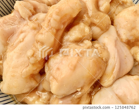 Stock photo: Raw meat (chicken) in a container Stock photo: Raw meat (chicken) in a container 125848762