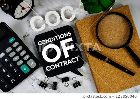 COC - Conditions of Contract acronym with calculator, alarm clock and magnifying glass, Business concept background 125850046