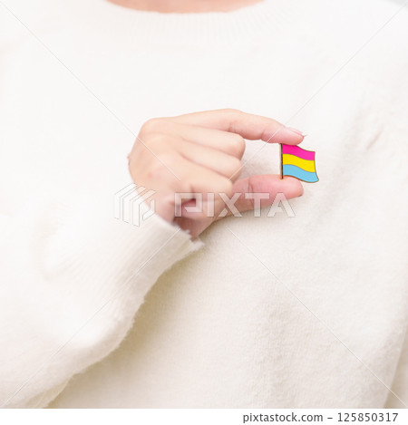 Pansexual Visibility Day and Panromantic May Awareness Day and LGBT pride month concept. hand holding pink, yellow and blue heart shape for Lesbian, Gay, Bisexual, Transgender and Marriage Equality Pansexual Visibility Day and Panromantic May Awareness Day and LGBT pride month concept. hand holding pink, yellow and blue heart shape for Lesbian, Gay, Bisexual, Transgender and Marriage Equality 125850317