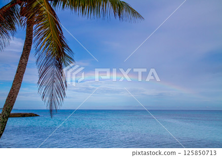 A rainbow over the lagoon of Fongafale Island in Funafuti Atoll, the capital of Tuvalu, an island nation in Oceania and Polynesia A rainbow over the lagoon of Fongafale Island in Funafuti Atoll, the capital of Tuvalu, an island nation in Oceania and Polynesia 125850713