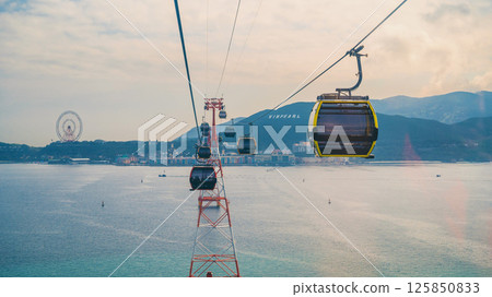 cable car cabins on ropeway over sea to Hon Tre Island at VinWonders Vinpearl Amusement Park in Nha Trang in Vietnam 125850833