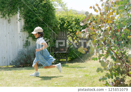 Girls playing in nature Girls playing in nature 125851079