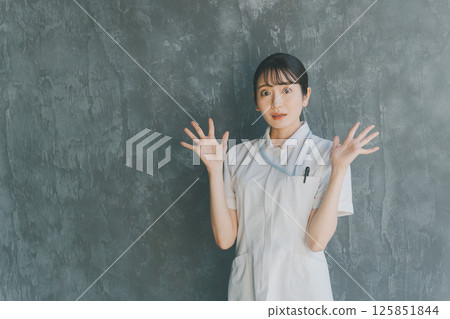 Surprised young nurse Surprised young nurse 125851844