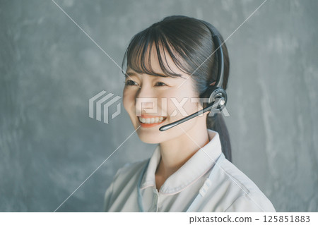 Nurse wearing a headset Nurse wearing a headset 125851883